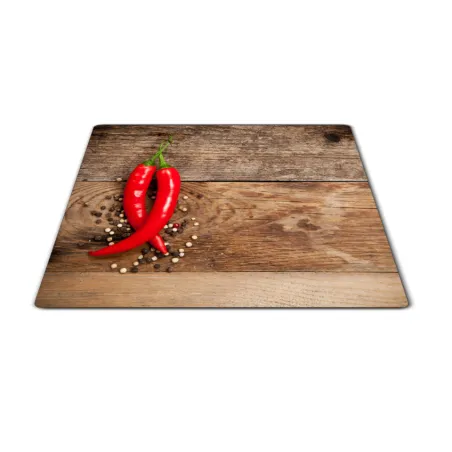 Skleněné prkénko chilli a pepř na dřevě